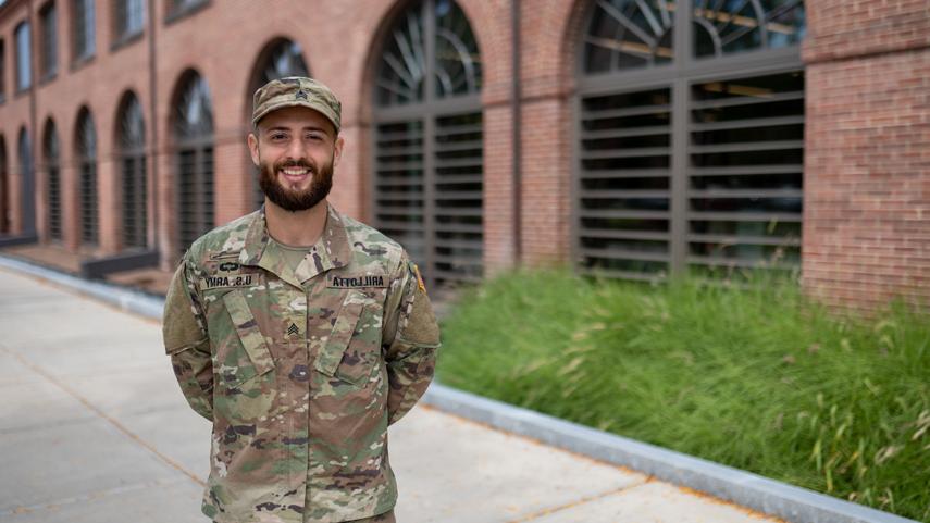 veteran student smiling proudly